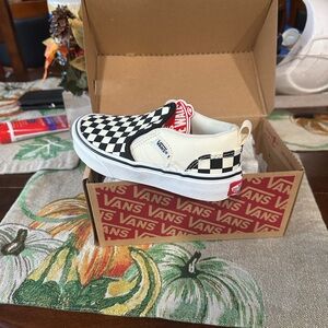 Vans Black and White Checkerboard Slip-Ons